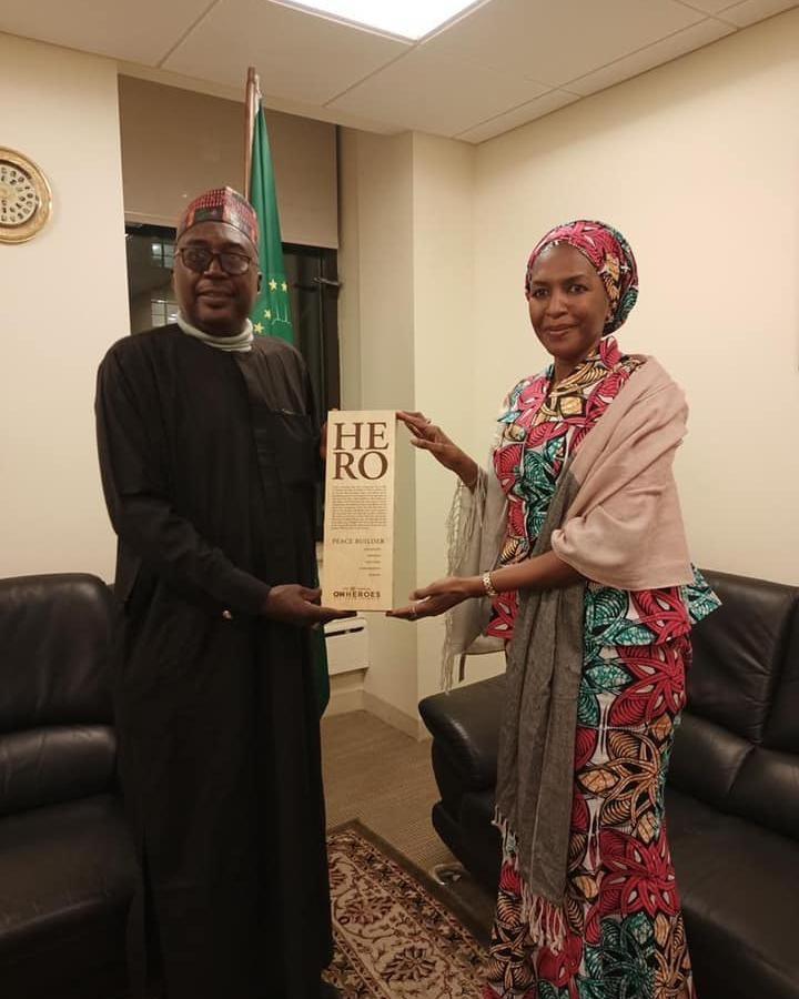 Receiving CNN Heroes Peace Builder plaque