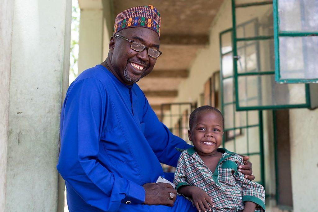 At the school entrance with a child